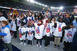 La Fondation PSG, PSG for Communities, devant le virage Auteuil au Parc des Princes